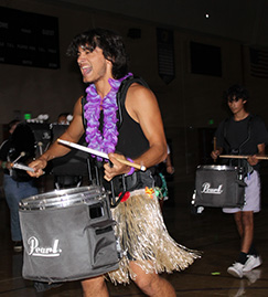Students playing drums